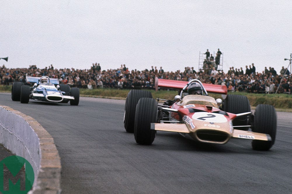 Jochen Rindt in a Lotus leads Jackie Stewart in a Matra in the 1969 British Grand Prix