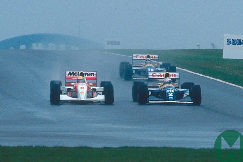 Ayrton Senna McLaren passes Alain Prost Williams to lead the 1993 European Grand Prix