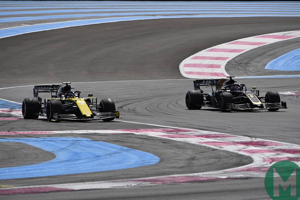 Daniel Riccardo drives off the track to overtake Romain Grosjean at the 2019 French Grand Prix