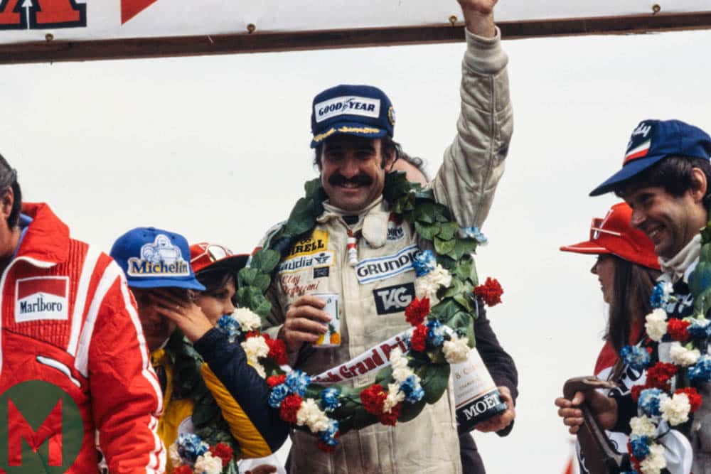 Clay Regazzoni on the top of the podium at the 1979 British Grand Prix