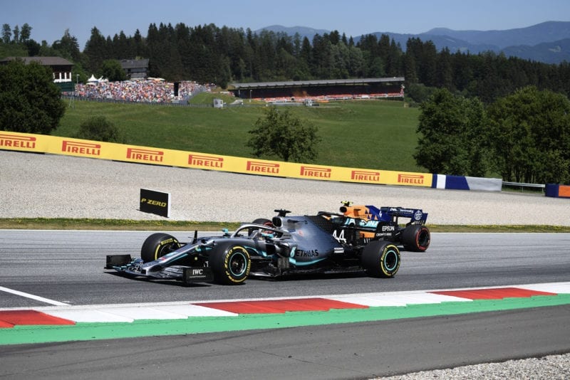 Lando Norris tries to pass Lewis Hamilton on this inside at the 2019 Austrian Grand Prix