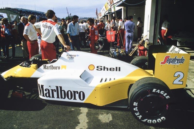 Keke Rosberg's yellow and white McLaren at the 1986 Portuguese Grand Prix