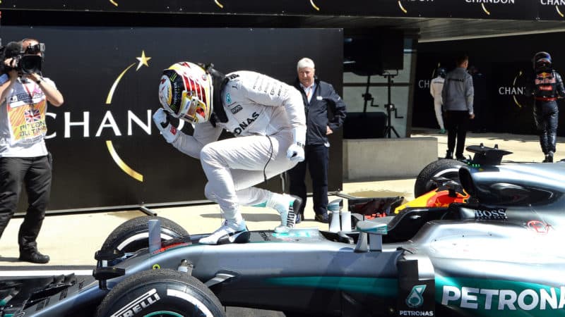 Lewis Hamilton celebrates after winning the 2016 British Grand Prix