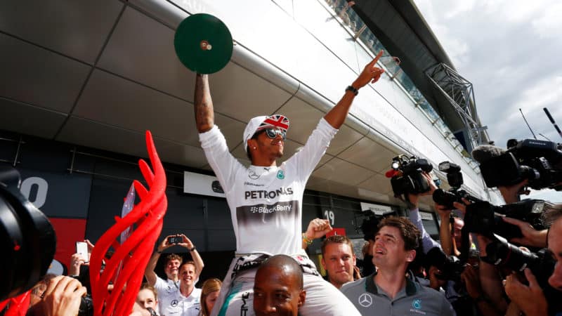 Lewis Hamilton celebrates winning the 2014 British Grand Prix