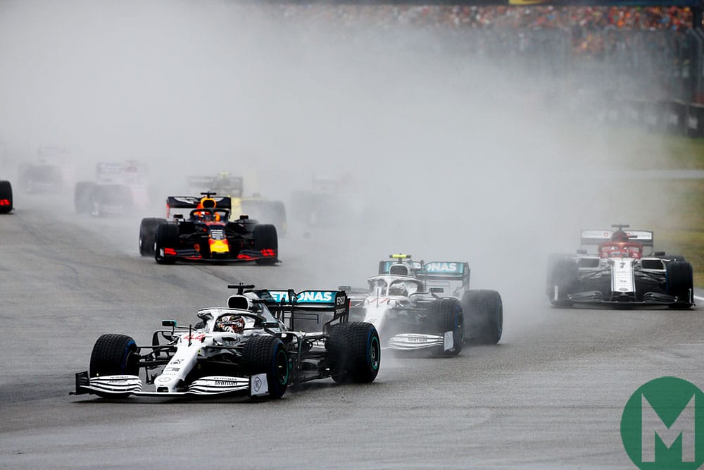 Lewis Hamilton's Mercedes leads at the start of the German GP