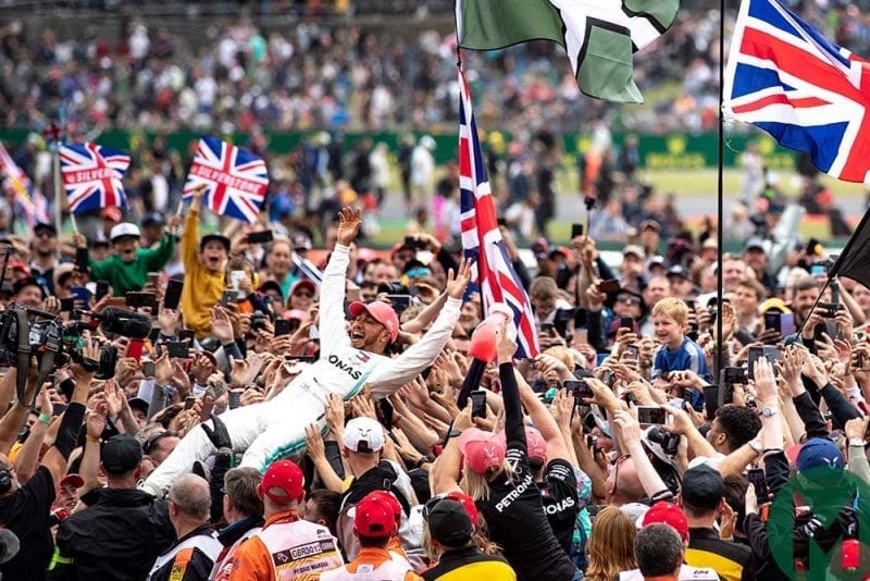 Lewis Hamilton crowd surfing after winning the 2019 British Grand Prix