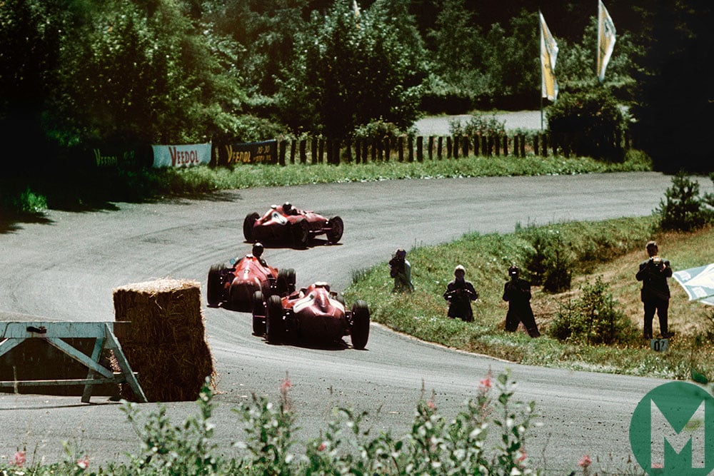 Fangio splits the Ferrari pair of Mike Hawthorn and Peter Collins