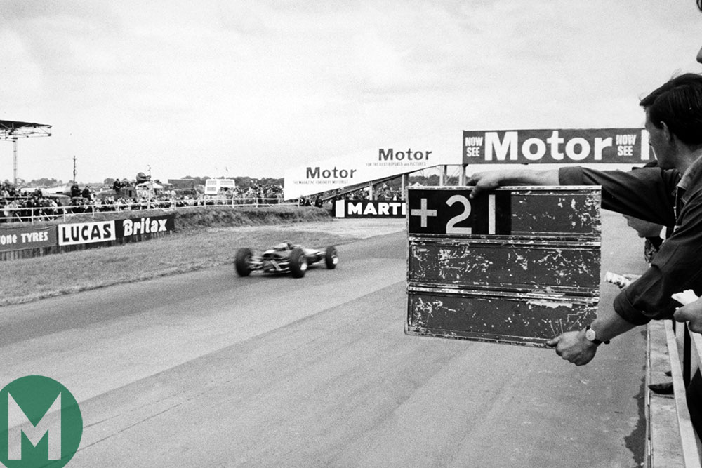 Jim Clark's pit signals tell him about his diminishing gap