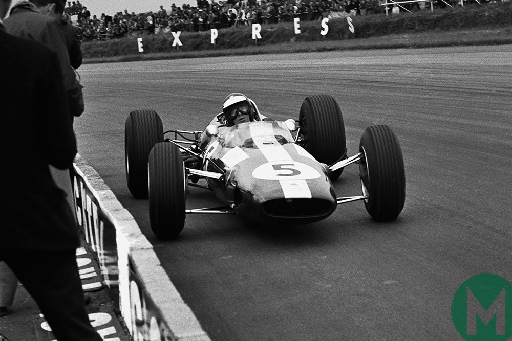 Jim Clark negotiates a turn in his Lotus-Climax in the 1965 British Grand Prix
