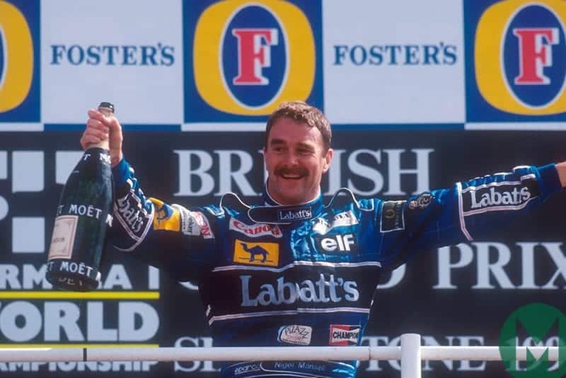 Nigel Mansell on the podium after winning the 1992 British Grand Prix