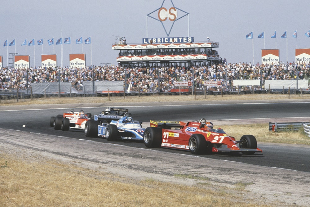 Gilles Villeneuve (Ferrari 126CK) leads Jacques Laffite (Ligier JS17-Matra), John Watson (McLaren MP4/1-Ford Cosworth), Carlos Reutemann (Williams FW07C-Ford Cosworth) and Elio de Angelis (Lotus 87-Ford Cosworth).