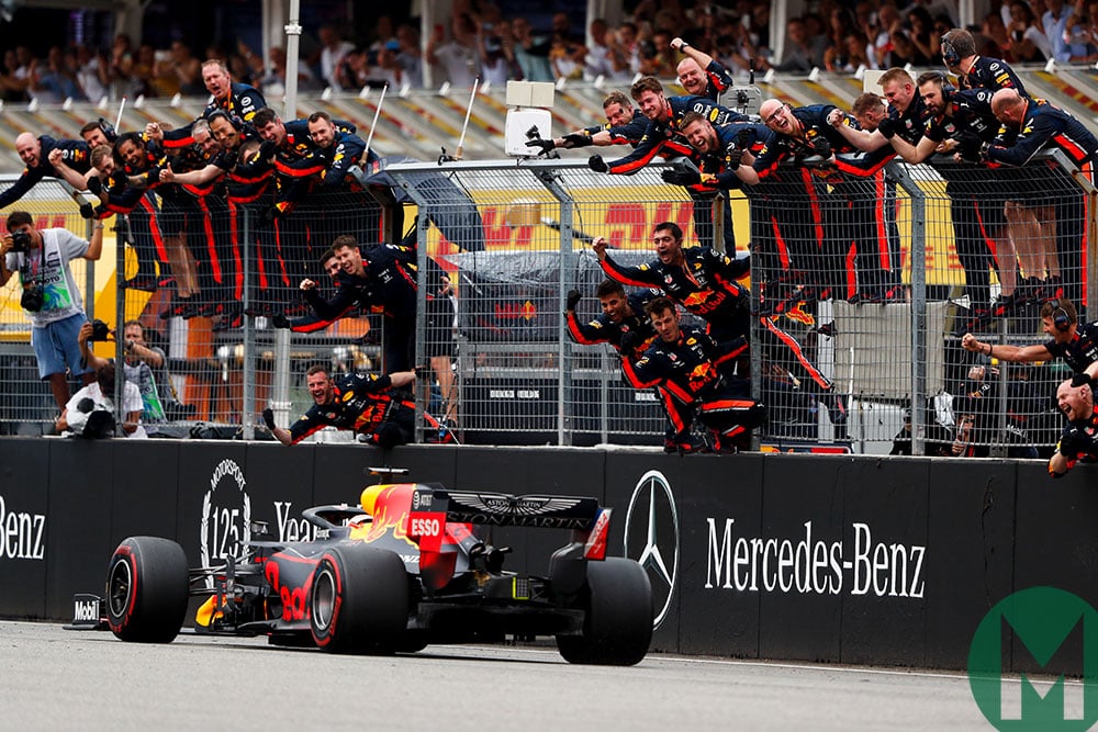 Max Verstappen is cheered by his Red Bull team as he wins the 2019 German Grand Prix