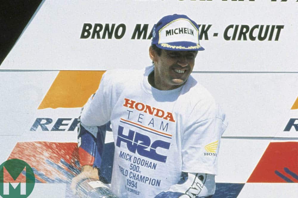 Mick Doohan celebrates winning the MotoGP championship at Brno in 1994