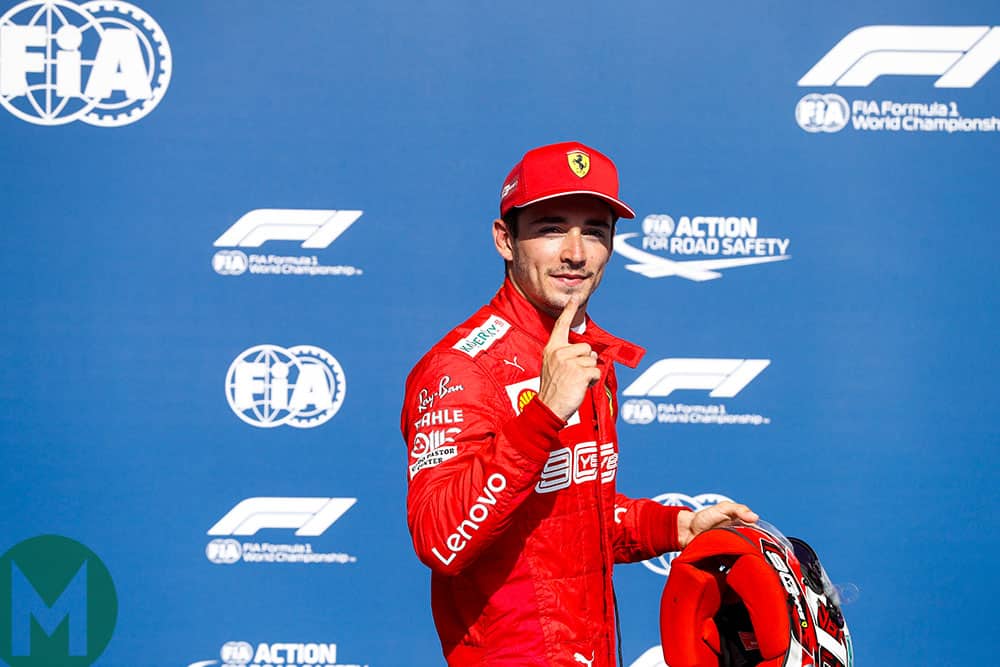 Charles Leclerc raises his finger to indicate his number one slot on the grid for the 2019 Belgian Grand Prix