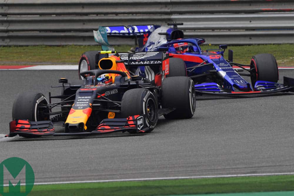 Pierre Gasly fights with Daniil Kvyat during the 2019 Chinese Grand Prix