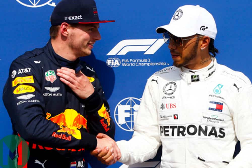 Max Verstappen and Lewis Hamilton shake hands after qualifying for the 2019 German Grand Prix