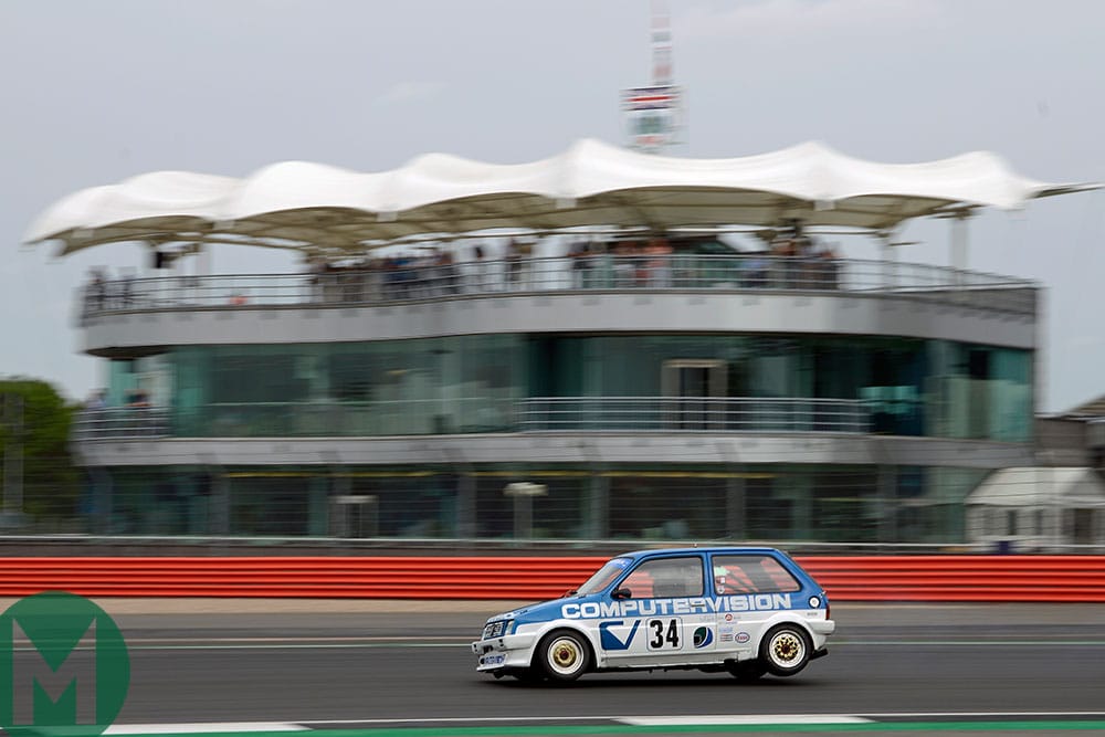 Patrick Watts gets on three wheels in his MG Metro Turbo at Silverstone Classic