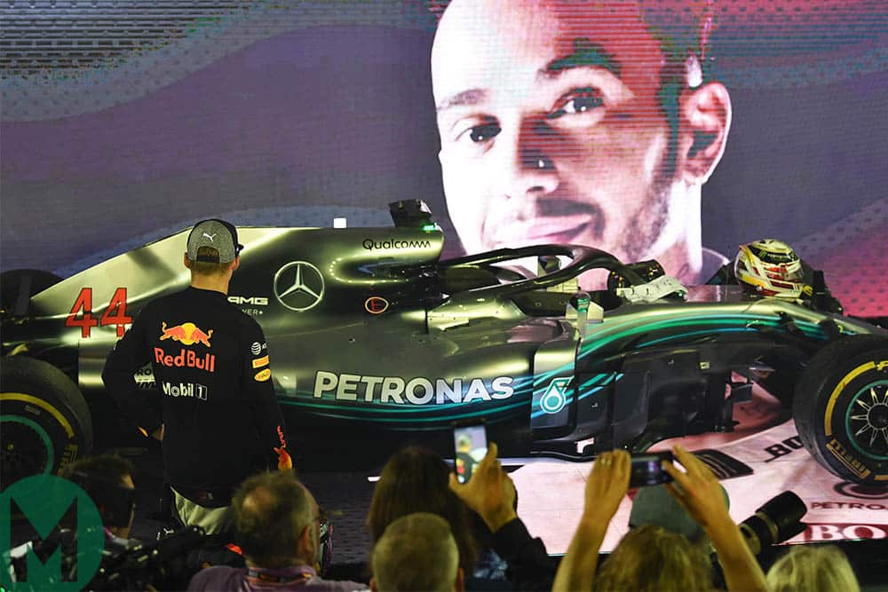 Max Verstappen looks at the Mercedes W09 in parc ferme at the 2018 Singapore Grand Prix