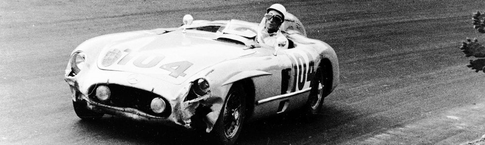 Stirling Moss at the wheel of the Mercedes SLR300 during the 1955 Targa Florio