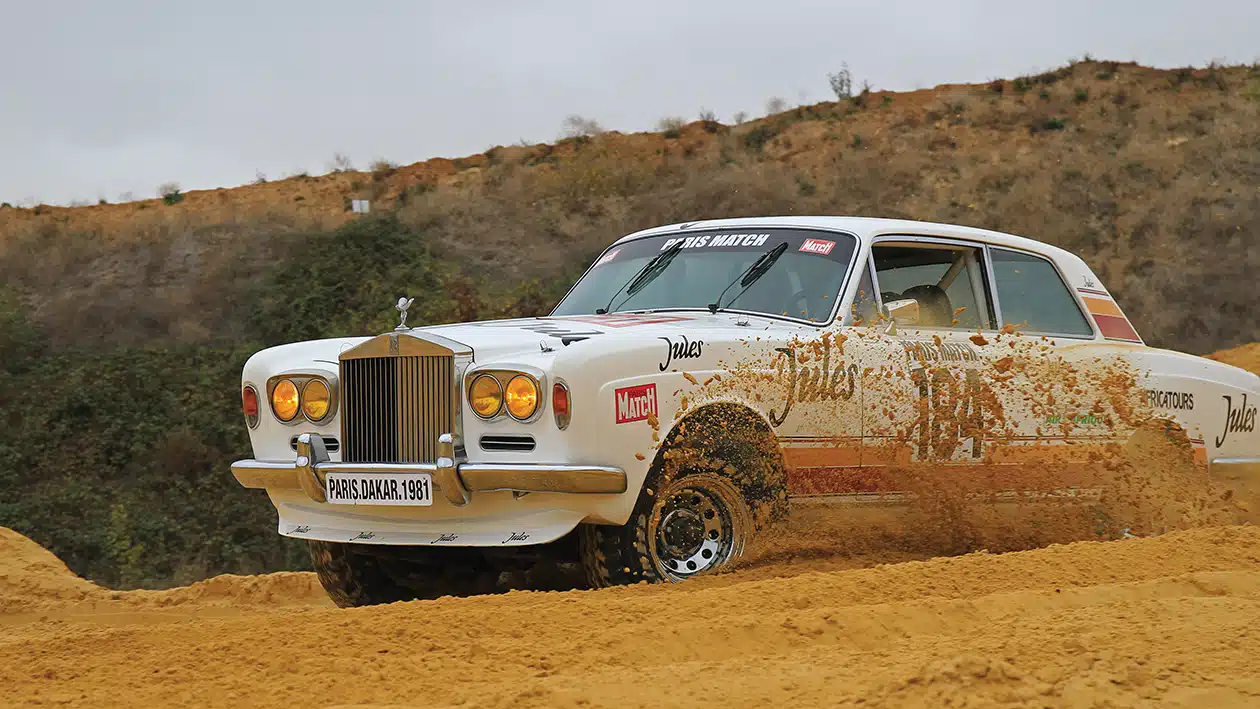 Rolls Royce Dakar car in sand dunes