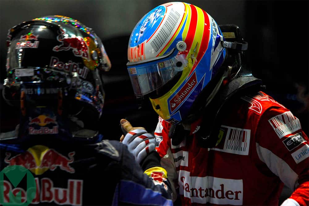 Fernando Alonso and Sebastian Vettel in parc ferme after the 2010 Singapore Grand Prix