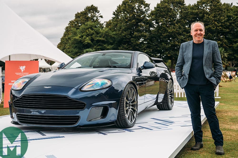 Ian Callum standing next to the Aston Martin Vanquish 25