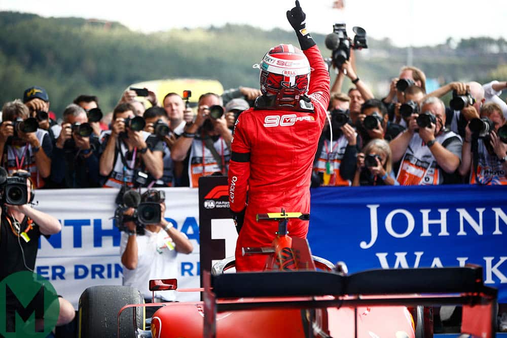 Charles Leclerc points to the sky in memory of Anthoine Hubert after winning the 2019 Belgian Grand Prix a day after Hubert's death