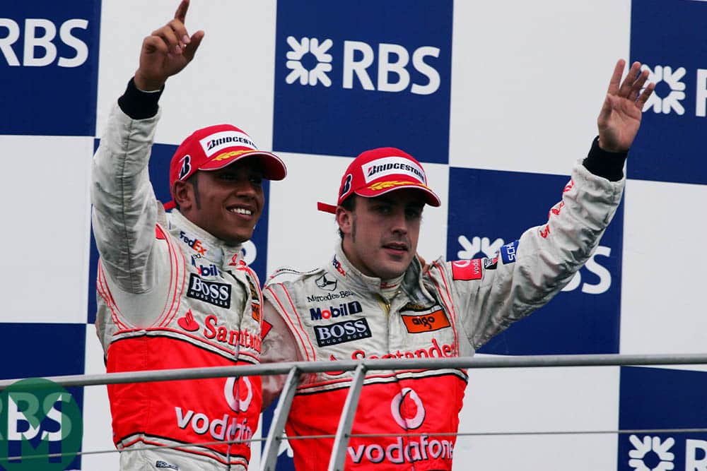 Lewis Hamilton and Fernando Alonso on the podium at the 2007 United States Grand Prix