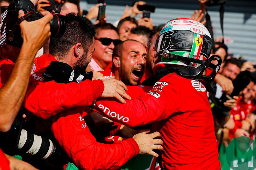 Charles Leclerc embraces his mechanics after winning the 2019 Italian Grand Prix
