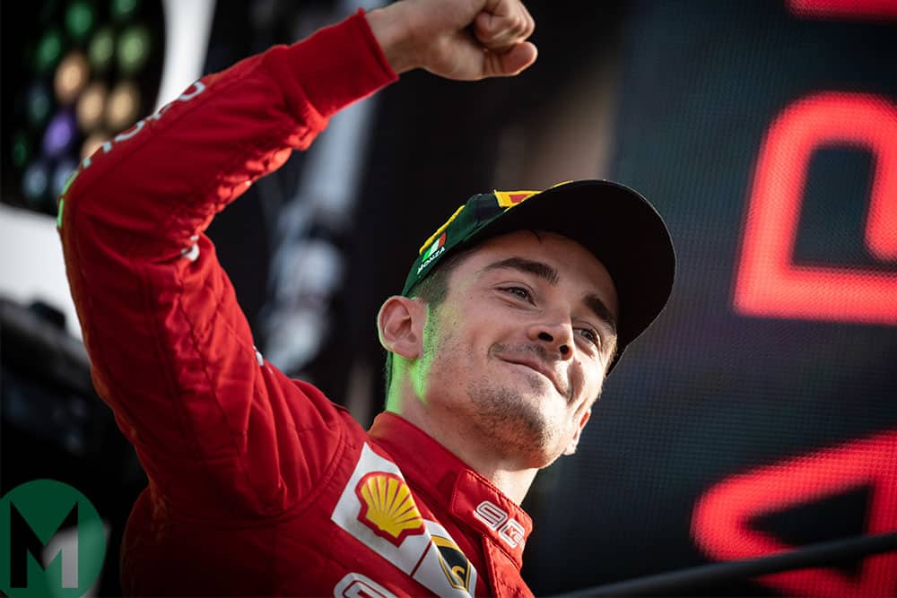 Charles Leclerc walks out onto the podium at Monza after winning the 2019 Italian Grand Prix