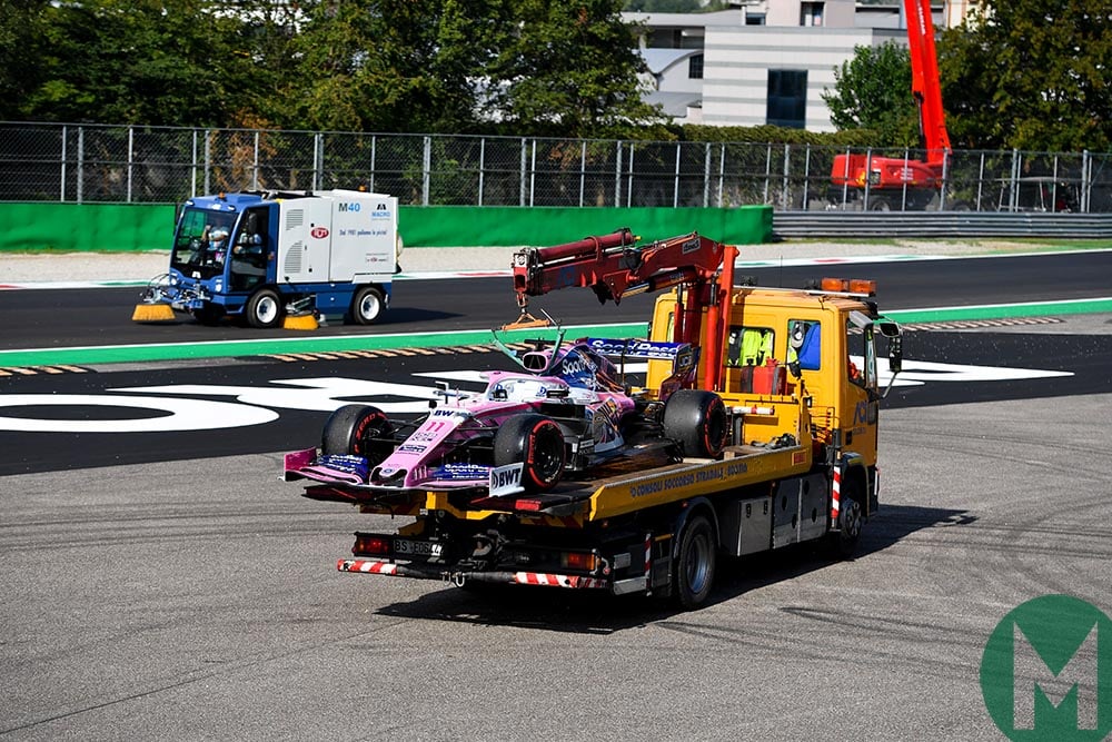 Sergio Perez's Racing Point F1 car on a low loader after losing power during qualifying for the 2019 Italian Grand Prix