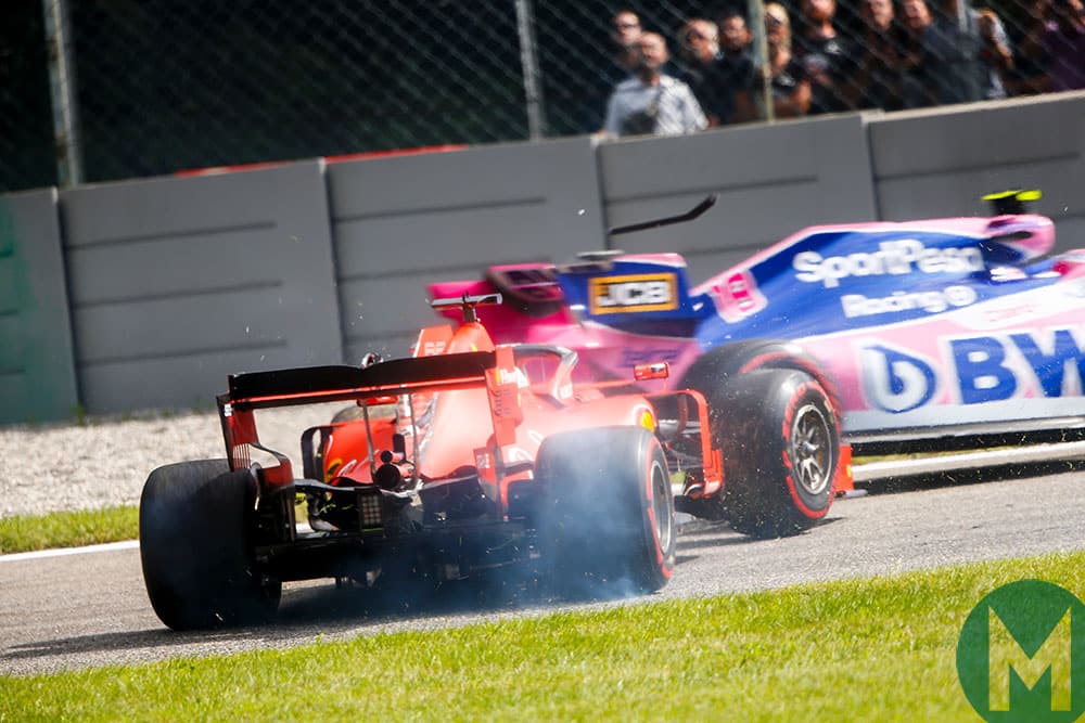 Sebastian Vettel hits Lance Stroll as he rejoins the track after spinning during the 2019 F1 Italian Grand Prix at Monza
