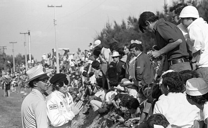 Jackie Stewart asks spectators to move back ahead of 1970 Mexican Grand Prix