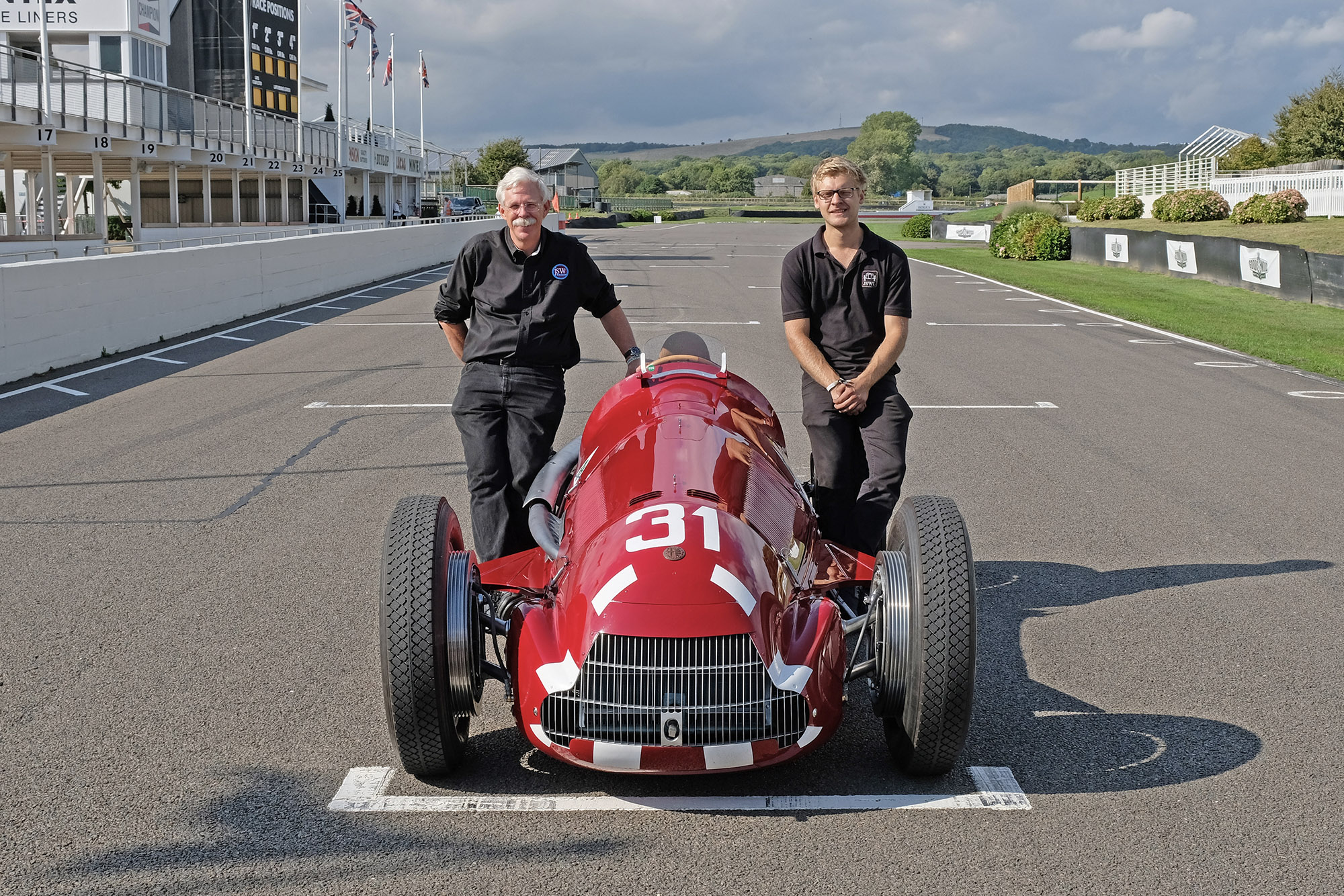 Jim Stokes and James Holloway with their restored Alfa 158