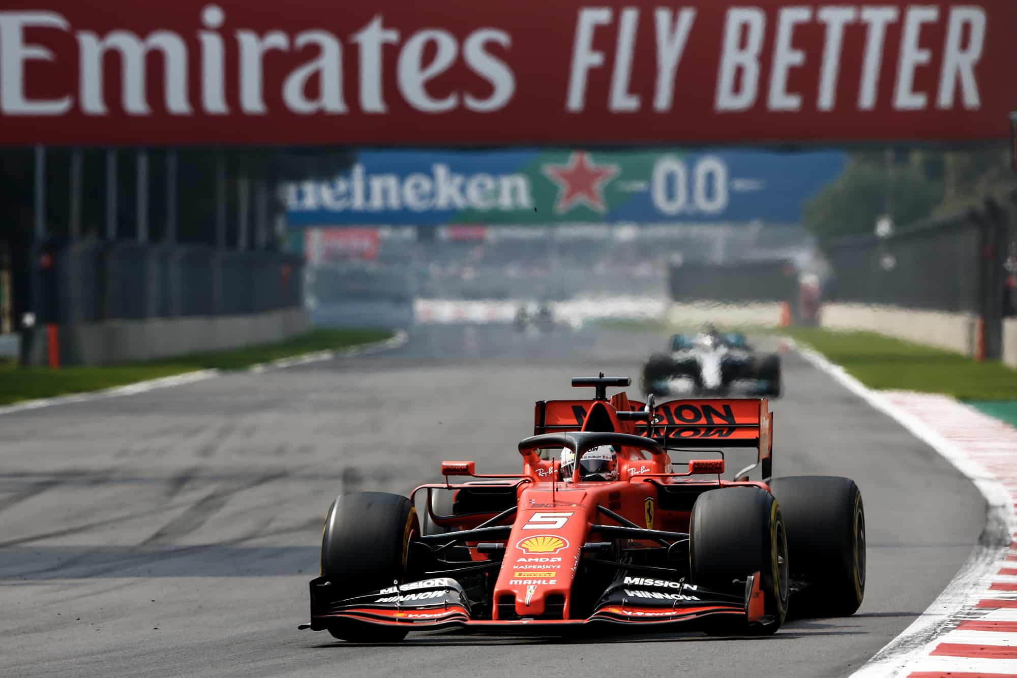 Sebastian Vettel leads Lewis Hamilton during the 2019 F1 Mexican Grand Prix