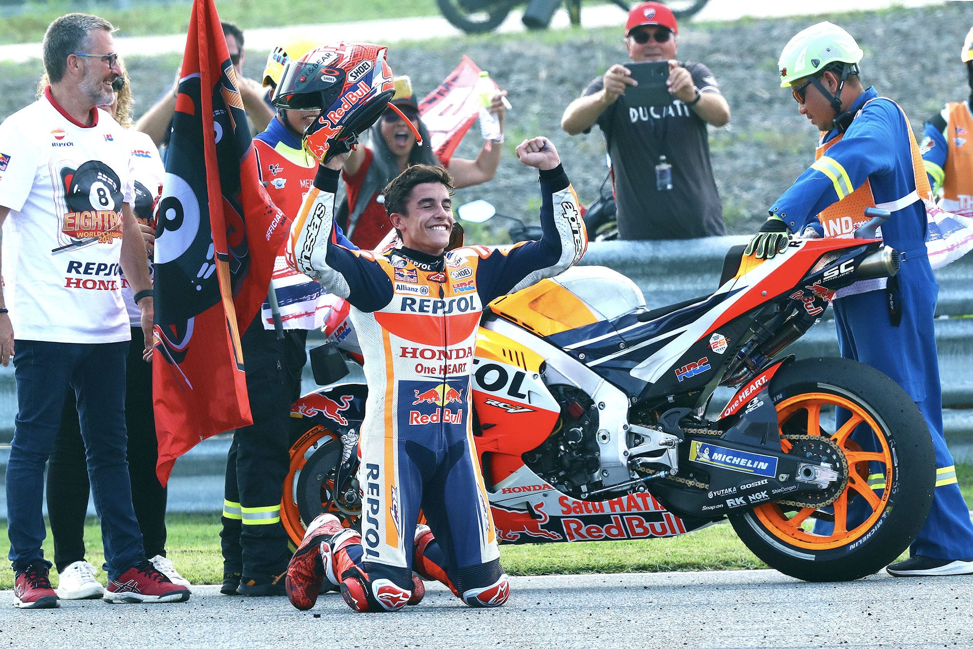 Marc Marquez on his knees after winning his sixth MotoGP championship at the 2019 Thailand Grand Prix