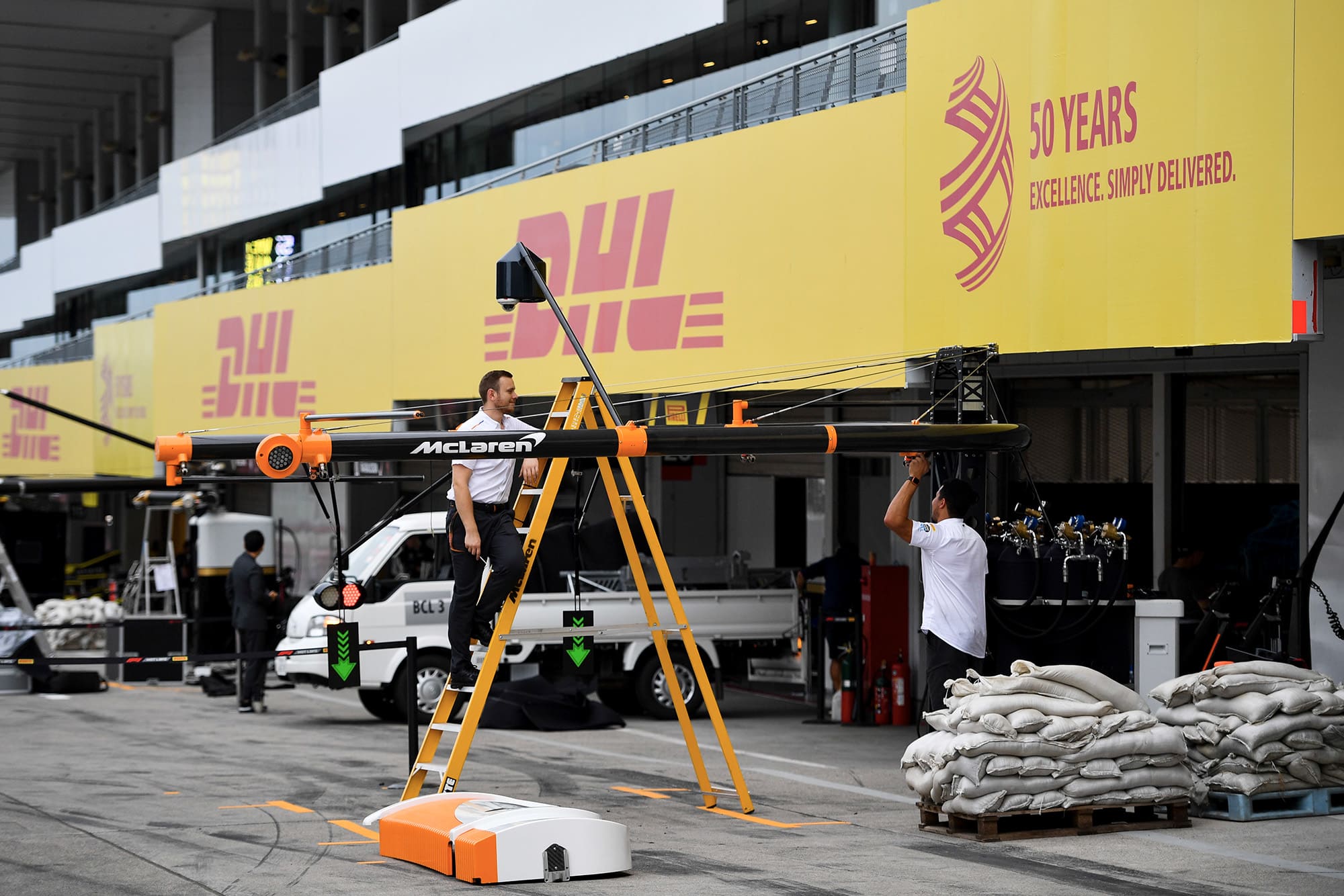 Sandbags outside the McLaren pits as qualifying for the 2019 F Japanese Grand Prix is postponed ahead of the arrival of a typhoon