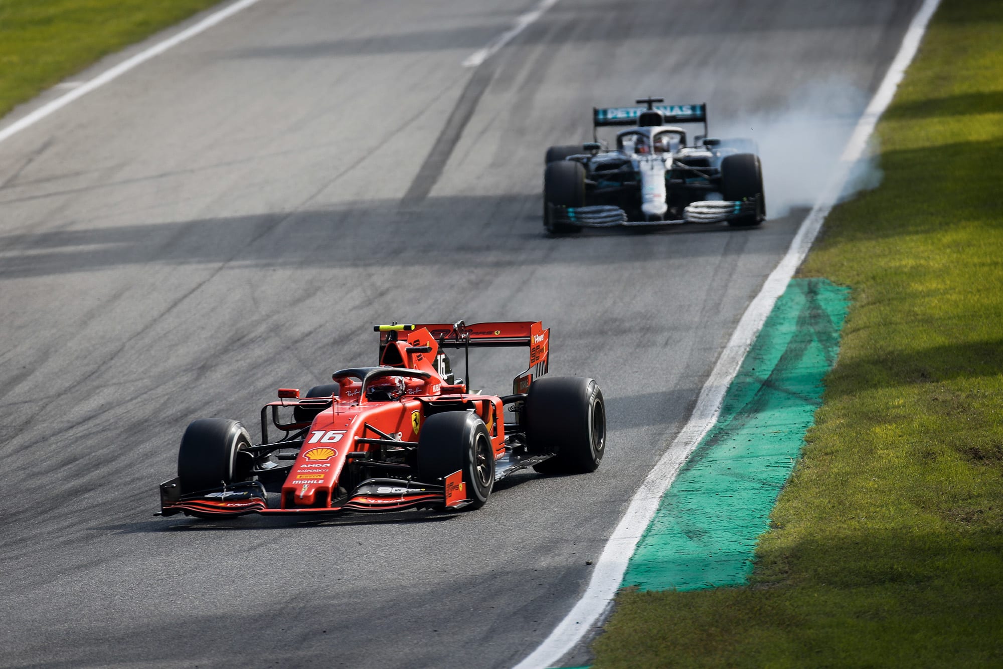 Lewis Hamilton locks up in pursuit of Charles Leclerc during the 2019 Italian Grand Prix