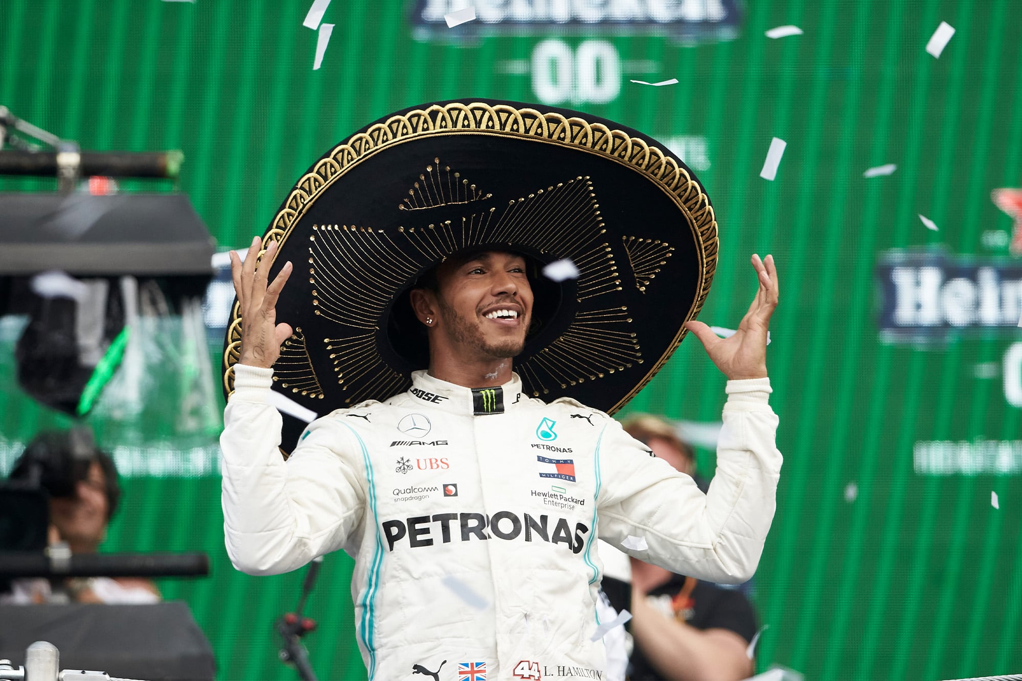 Lewis Hamilton celebrates in his sombrero after winning the 2019 Mexican Grand Prix