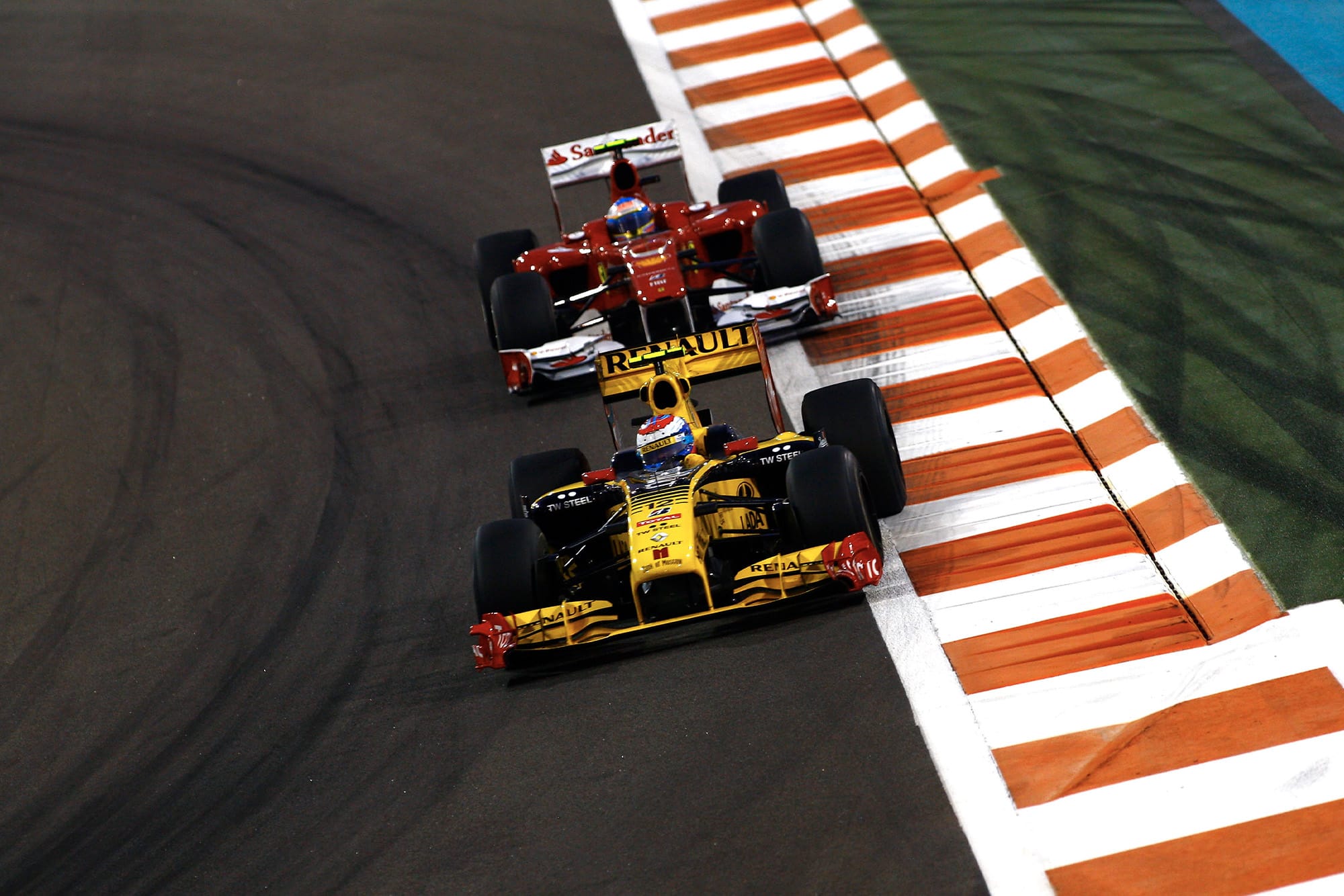 Fernando Alonso stuck behind Vitaly Petrov during the 2010 Abu Dhabi Grand Prix