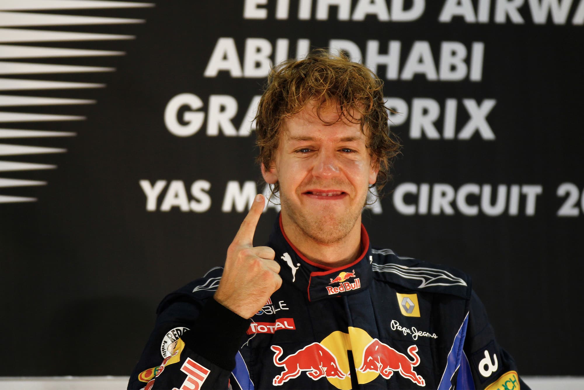 Sebastian Vettel celebrates winning the 2010 world championship and Abu Dhabi Grand Prix