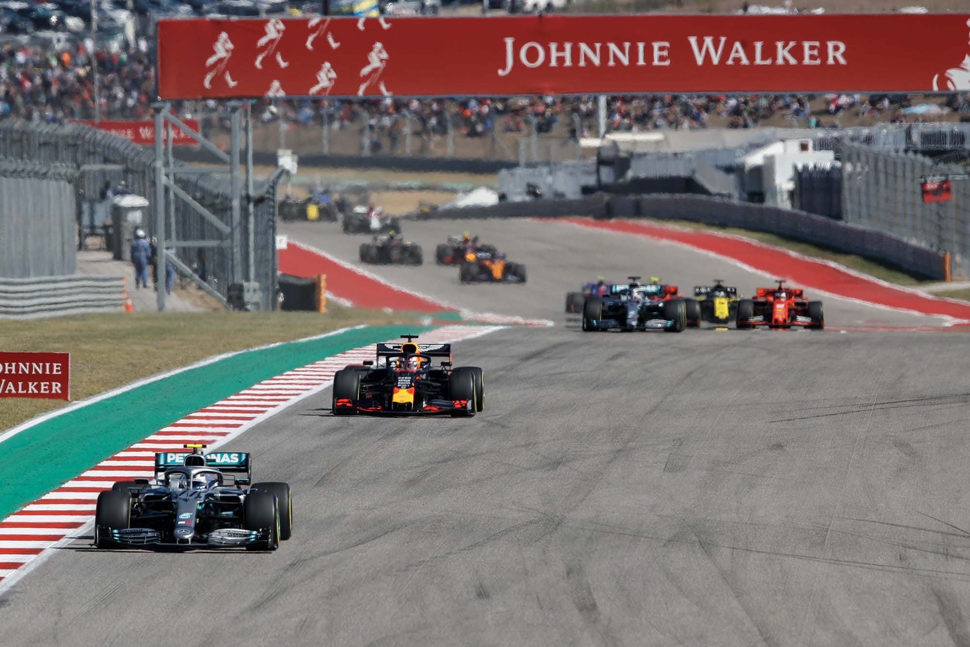 Valtteri Bottas leads from Max Verstappen and Lewis Hamilton early in the 2019 United States Grand Prix