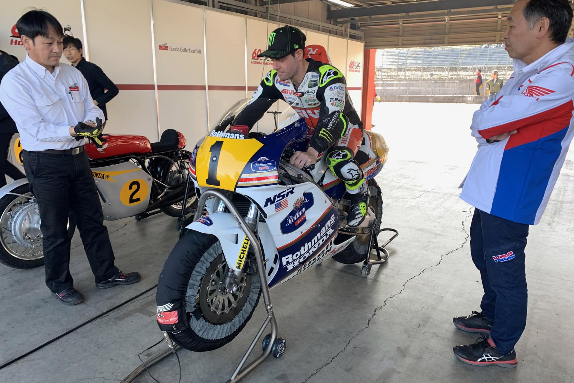 Cal Crutchlow on Eddie Lawson's Honda NSR500 in the pits during the Honda Thanks Day 2019