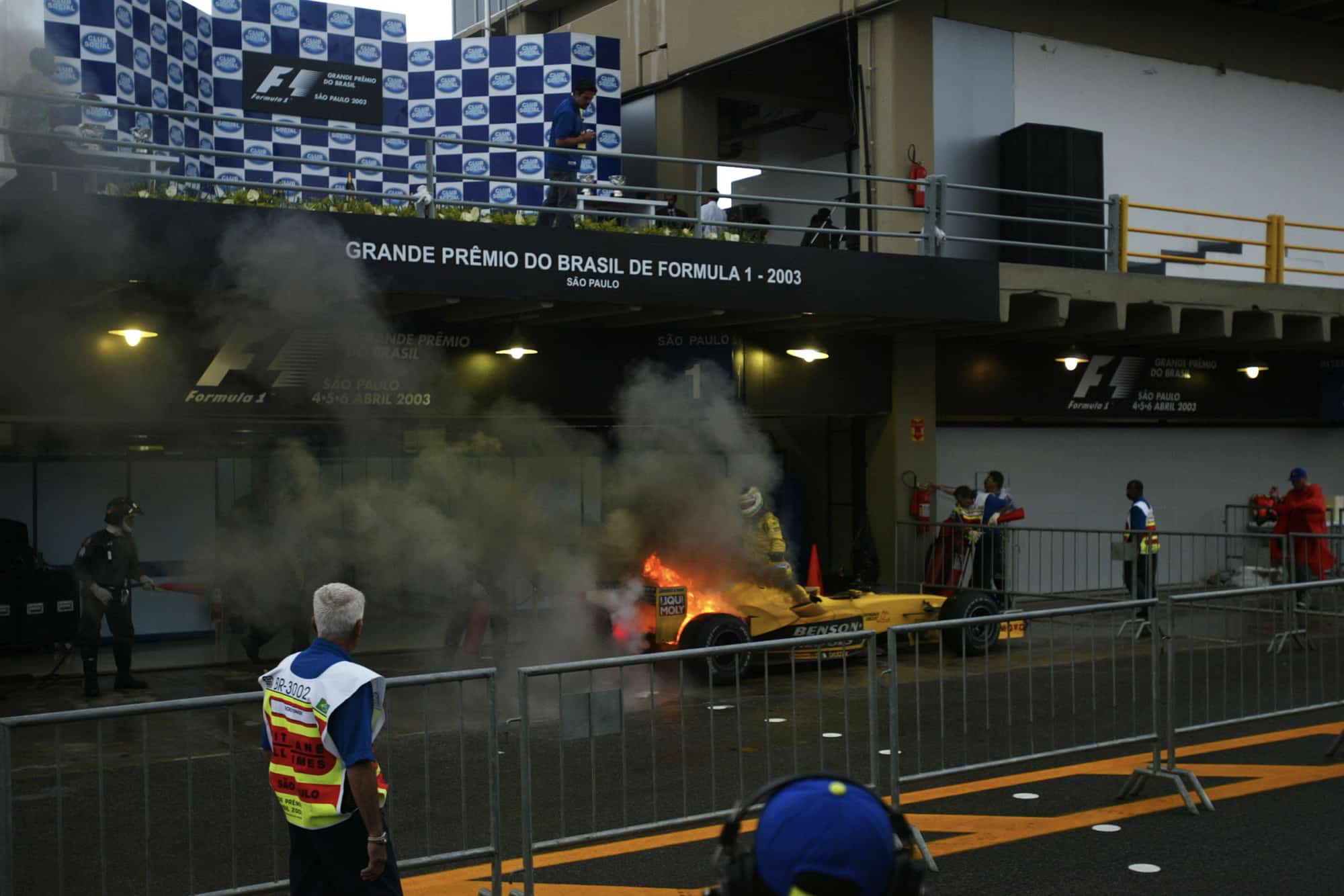 Giancarlo Fisichella's Jordan catches fire at the end of the 2003 Brazilian Grand Prix