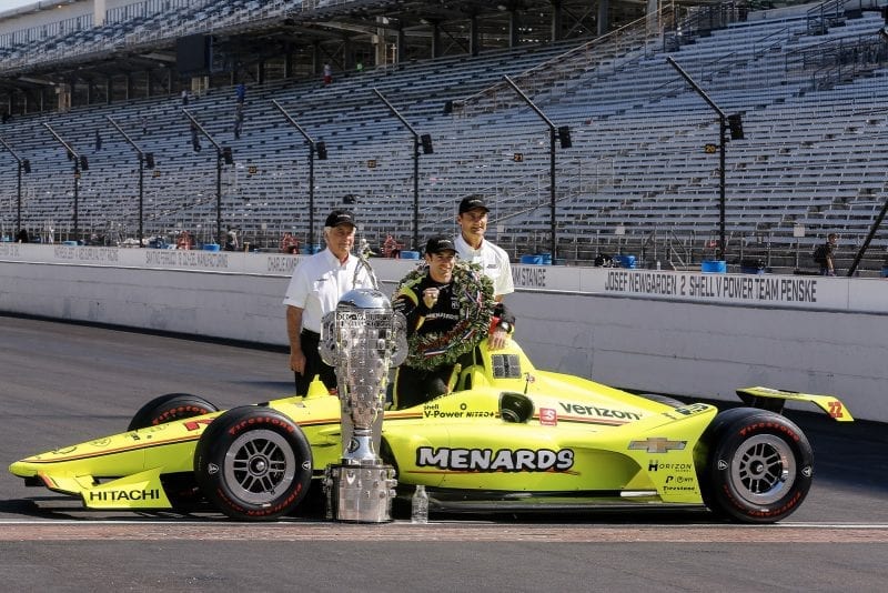 Roger Penske and Simon Pagenaud pose for the winners photos after the 2019 Indy 500