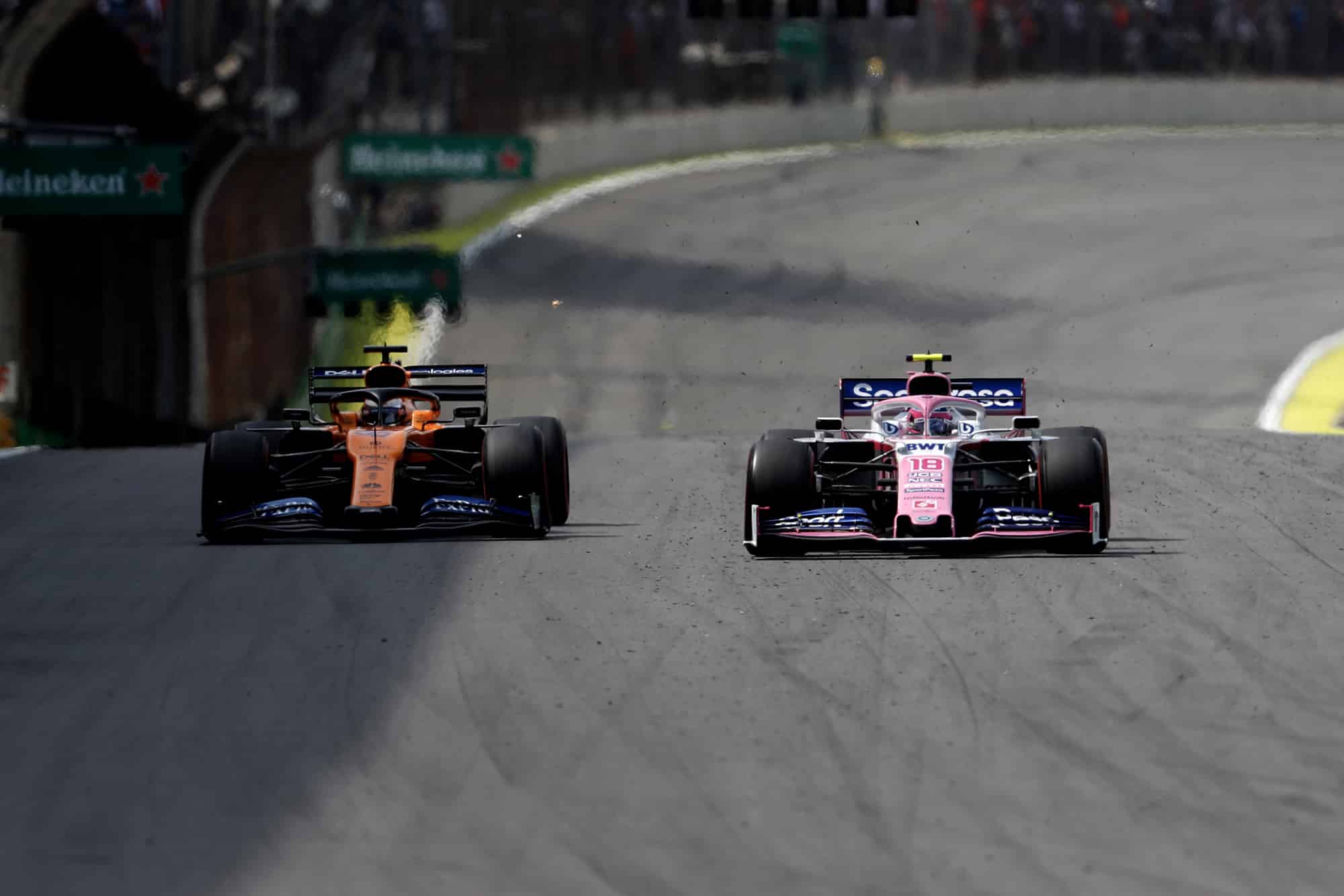 Carlos Sainz passes Lance Stroll at the 2019 F1 Brazilian Grand Prix