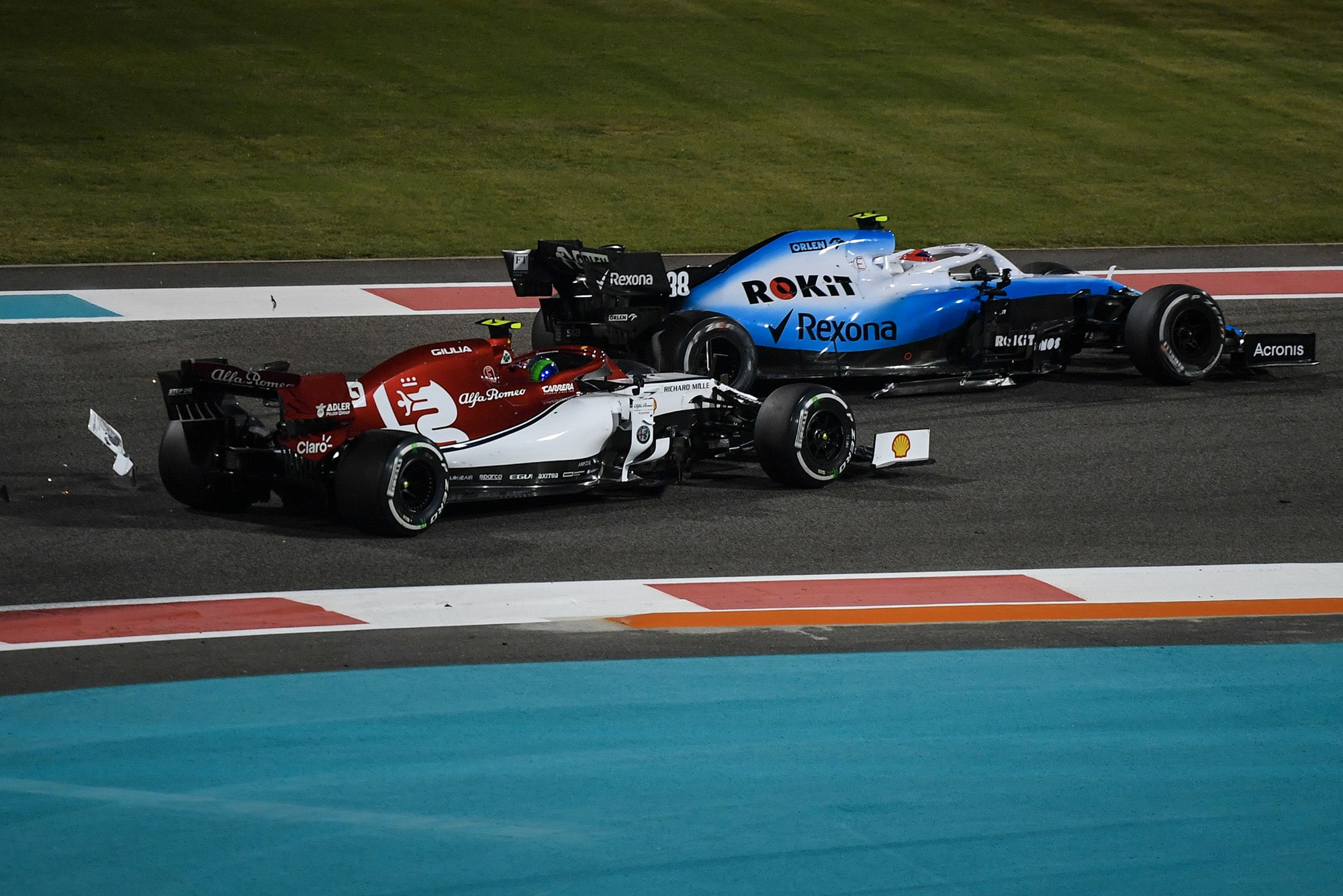 Debris falls onto the track after Antonio Giovinazzi and Robert Kubica collide at the 2019 Abu Dhabi Grand Prix