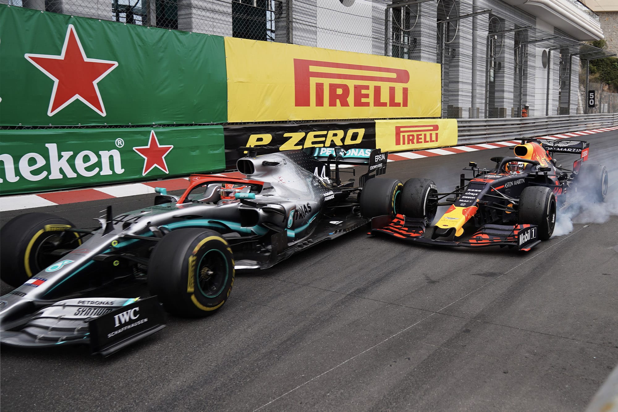 Lewis Hamilton and Max Verstappen make contact at the Nouvelle Chicane during the 2019 Monaco Grand Prix