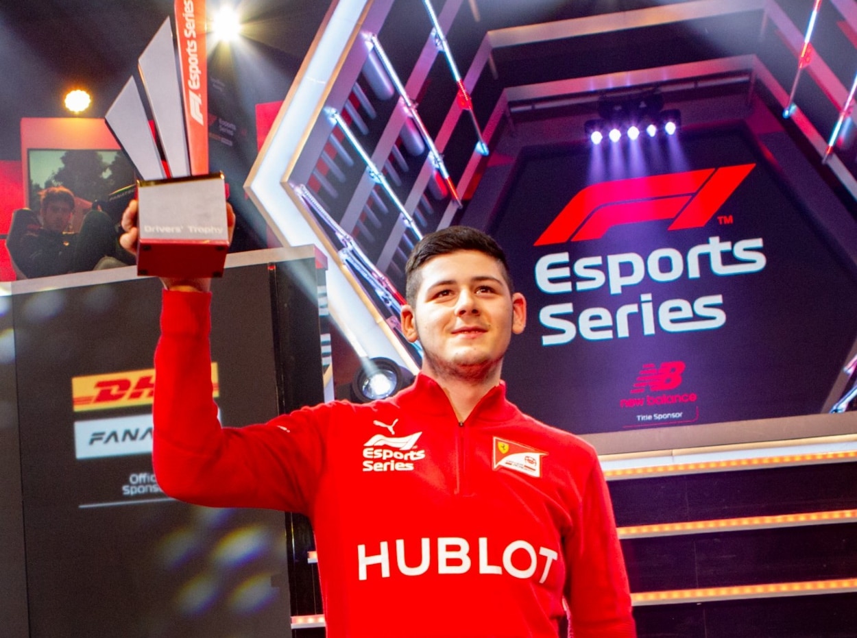 David Tonizza celebrates winning the 2019 F1 Esports series championship