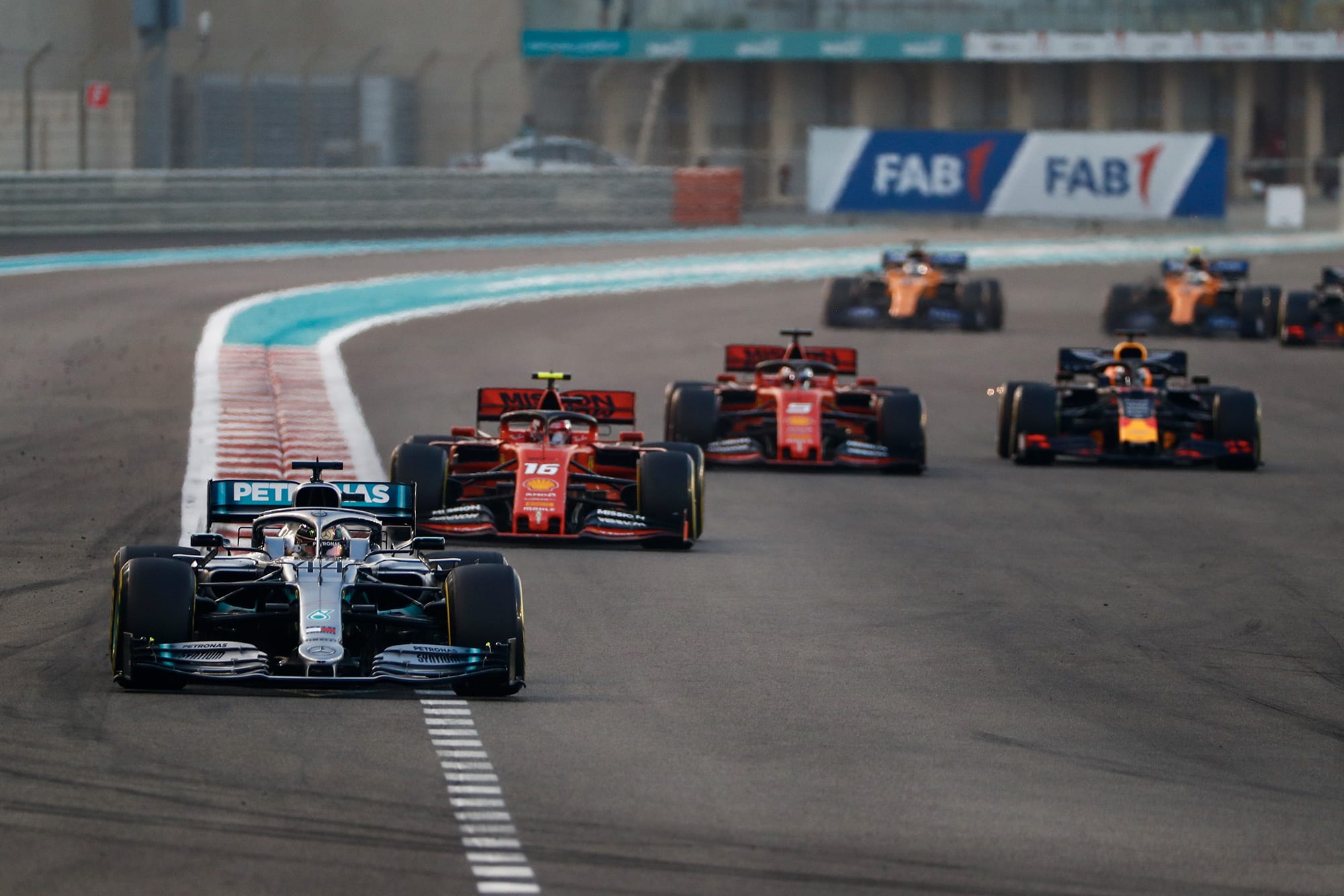Max Verstappen defends against Sebastian Vettel on the first lap of the 2019 Abu Dhabi Grand Prix